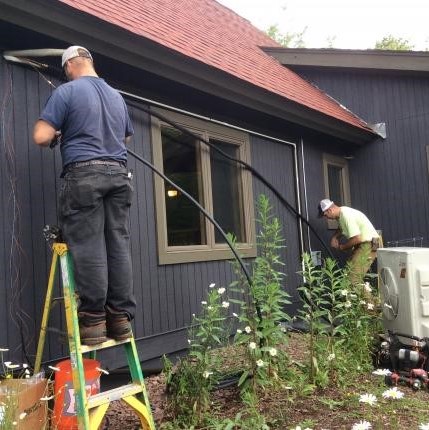 CEE staff working on heat pump
