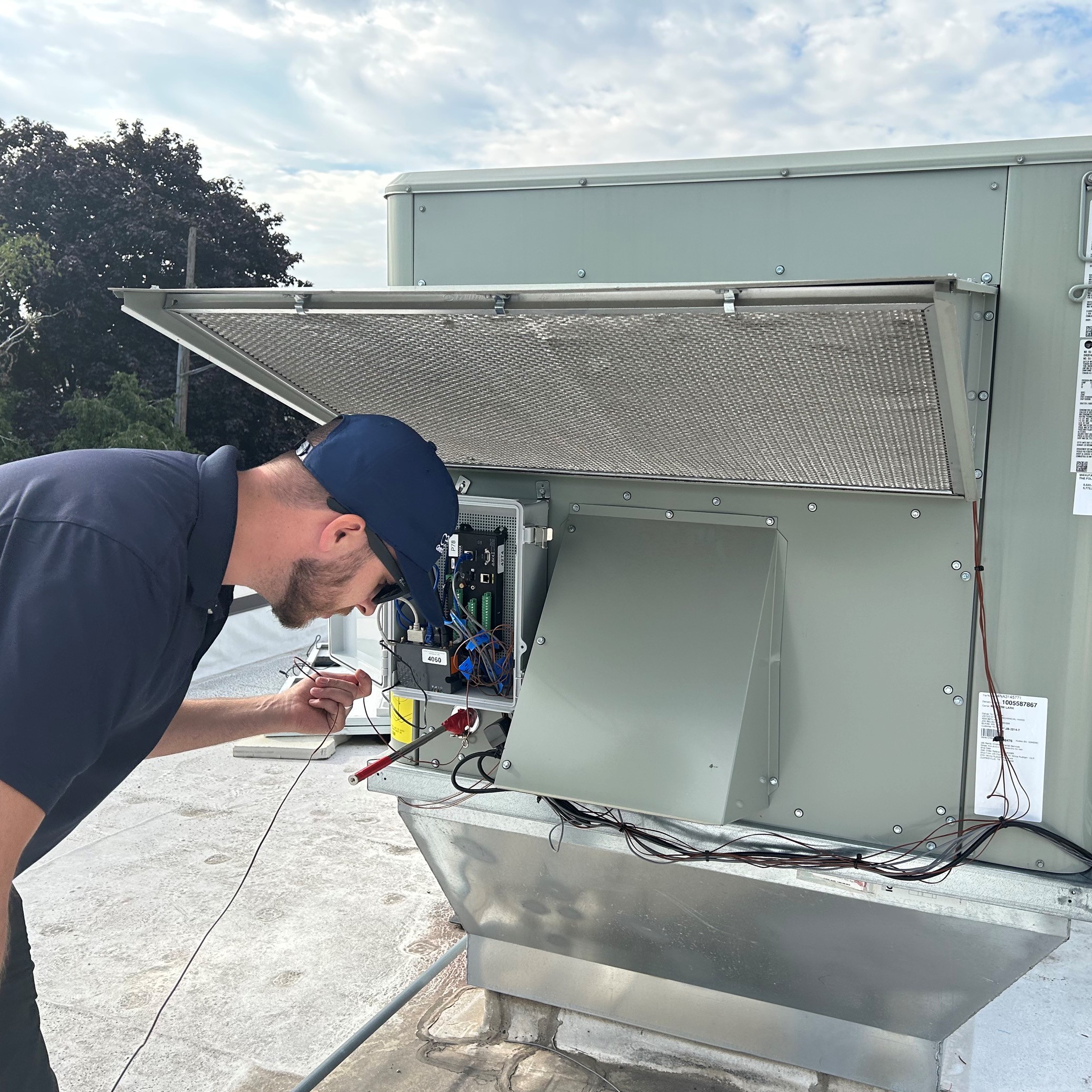 CEE staff working on heat pump RTU