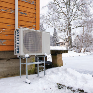 heat pump outside of home during winter