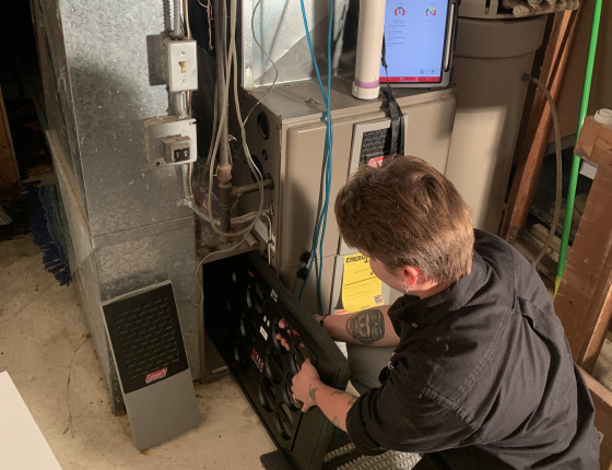 staff performing duct test