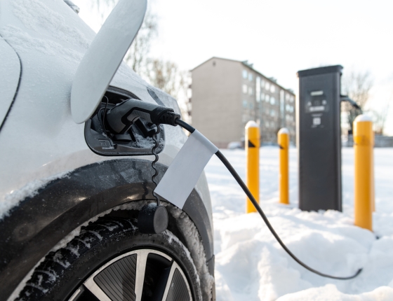 EV charging at a public charger during the winter