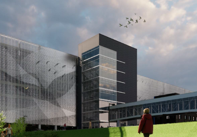 person walking by building