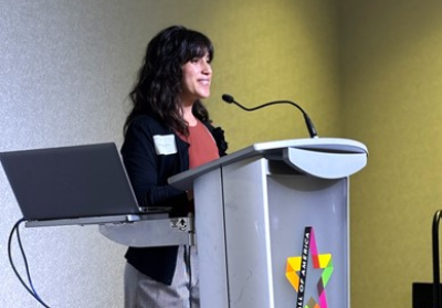 Ana De La Torre giving a presentation at CEE's all-staff meeting