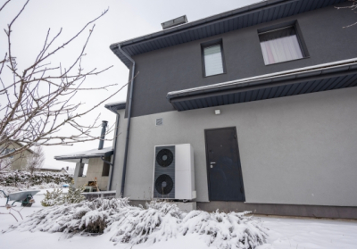 heat pump outside of home in winter climate