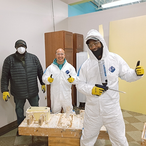 three people working on an energy project