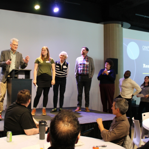 cee president and group talking on stage