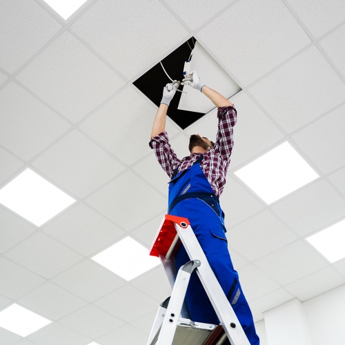 Man installing lighting