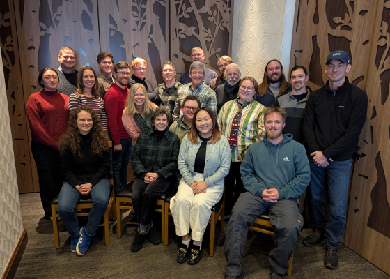 The team celebrating at their 25th anniversary party