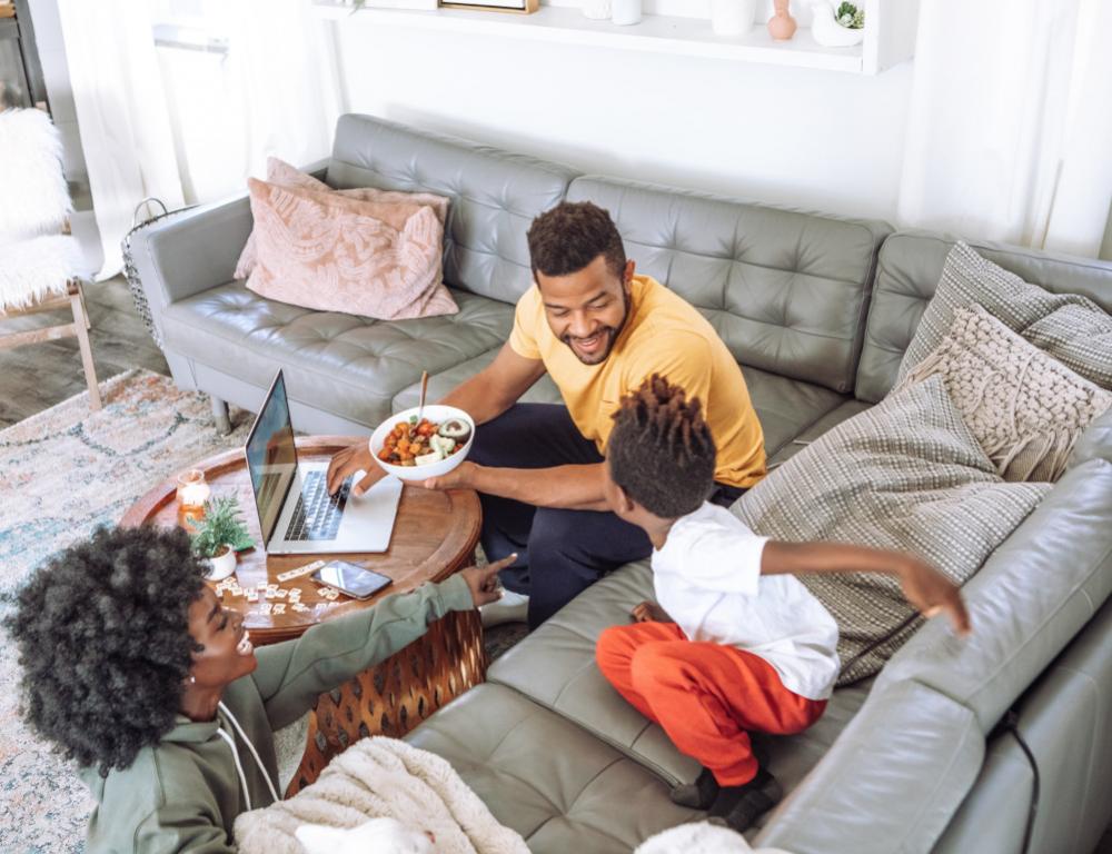 Happy Family sitting on a couch