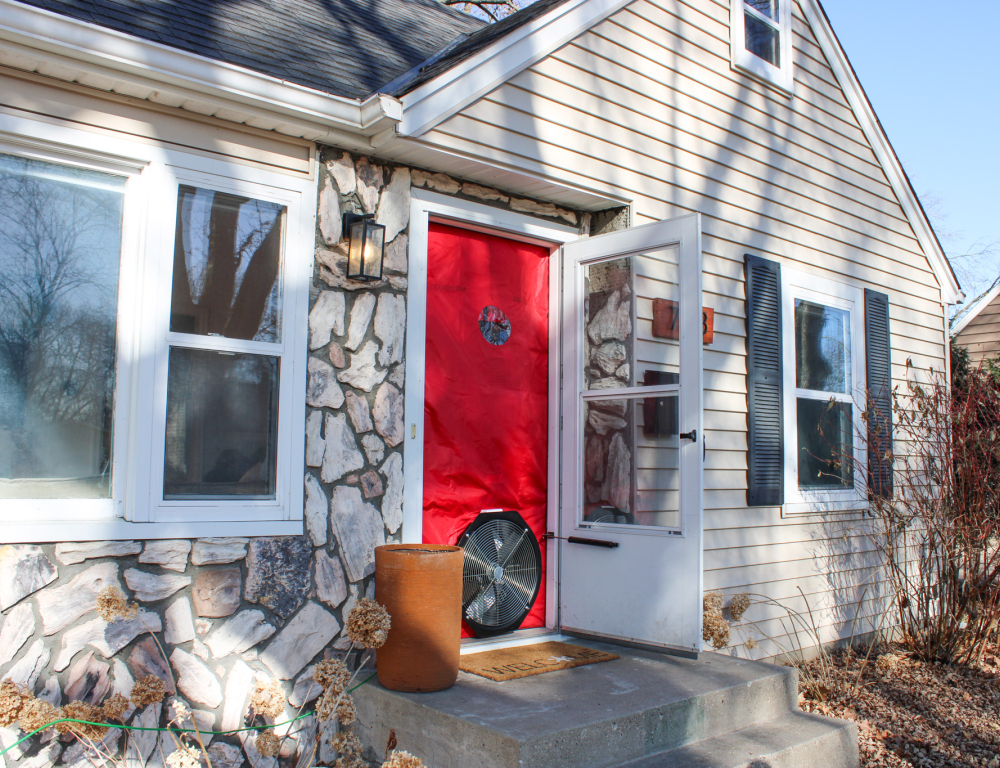 home with fan in front door