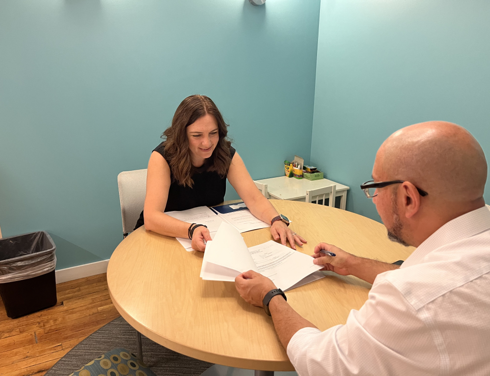 two people closing a loan