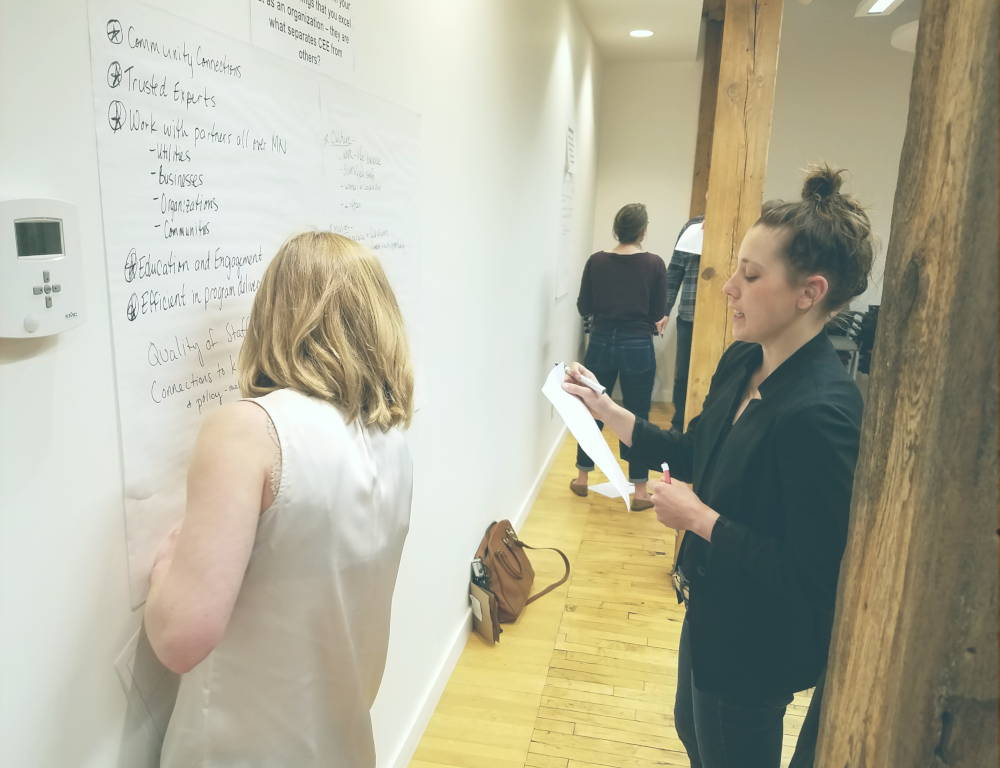 two women at a meeting