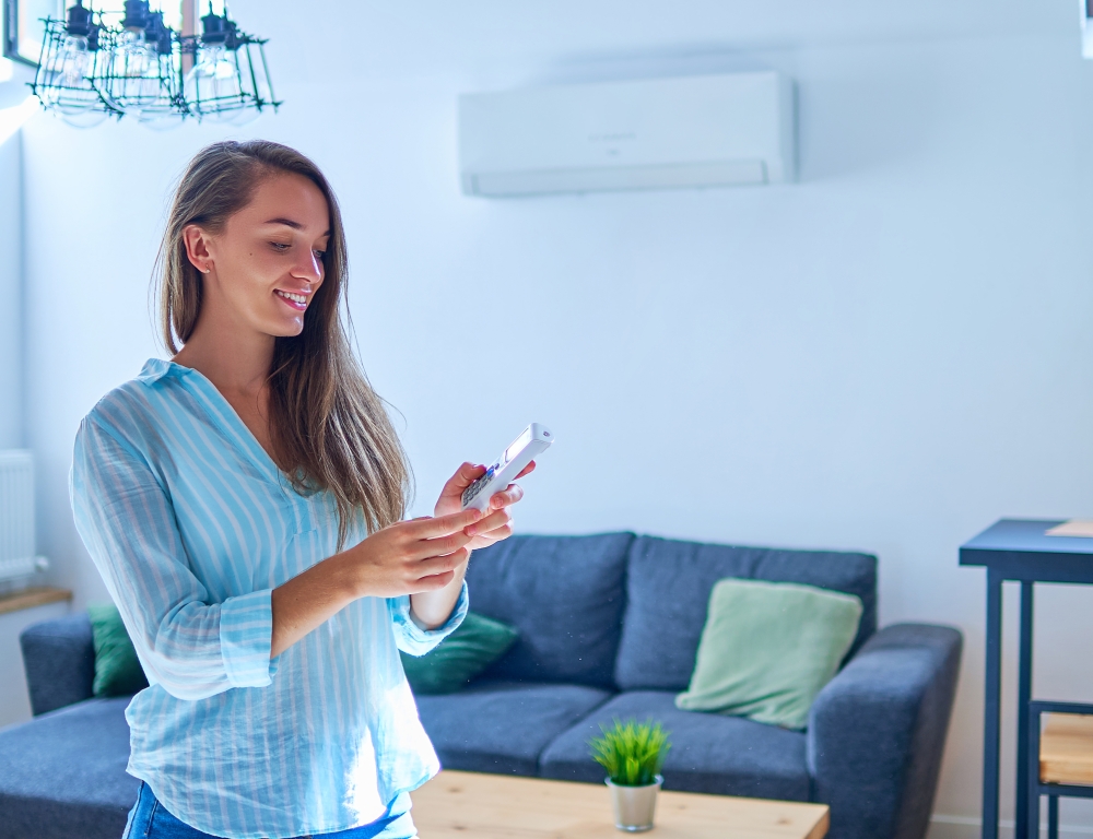 woman with air source heat pump