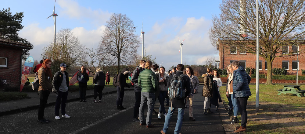 Climate Smart Municipalities staff seen gathering near wind source