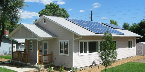 A house with solar panels on the roof.
