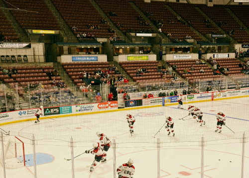 hockey players skating on ice
