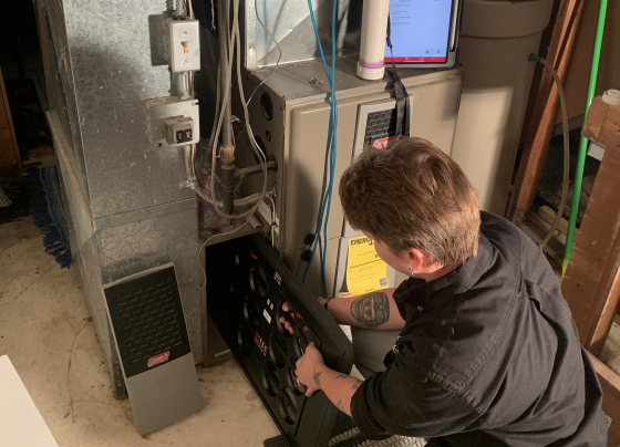 staff performing duct test