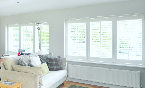 White living room with lots of windows