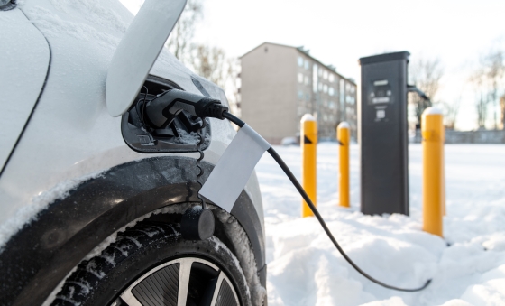 EV charging at a public charger during the winter